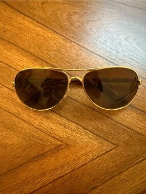 Oakley | Gold Frame Brown Lens Women's Sunglasses